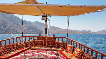 Cruise on a traditional dhow boat along the coast and beautiful fjords of Khasab, Musandam, Oman 