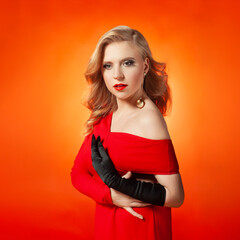 Glamorous Woman in Red Dress with Beauty Makeup