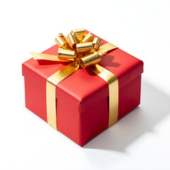 Obraz premium A gift box wrapped in red and gold paper on a white background