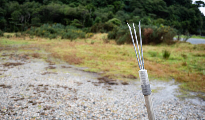 Fishing chrome tool spear trident close up sharp