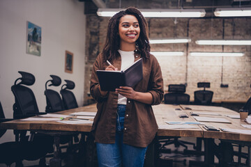 Portrait of corporate business lady hold notepad brainstorm wear shirt modern interior office indoors