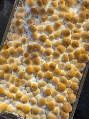 Toasted Miniature Marshmallows On Top Of Sweet Potato Casserole