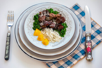 The best and most traditional Brazilian feijoada top view in creative and original photography