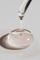 Minimalist Close-Up of a Dropper with Clear Serum on Textured Surface