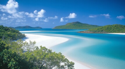 Idyllic tropical beach scene with white sand, turquoise water, and lush green vegetation under a bright blue sky.