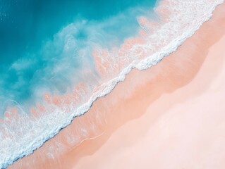 Fototapeta premium a beautiful sandy beach with soft, golden sand stretching along the shore. Gentle blue ocean waves roll in, their edges frothing into delicate white foam as they meet the sand