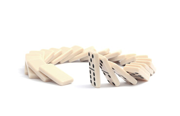 Domino effect. Tiles falling on white background