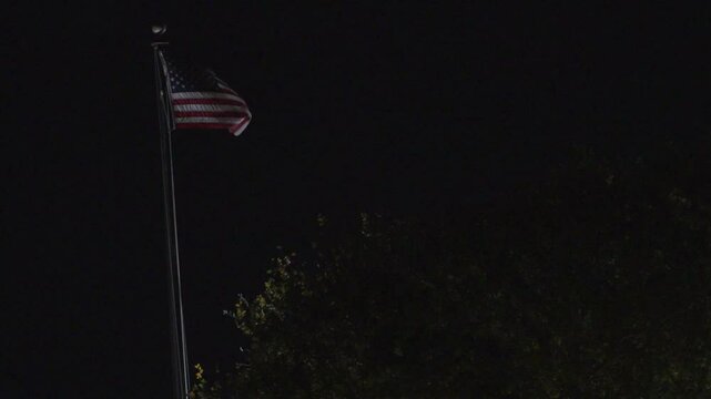 USA Flag waving at night in Austin, Texas 11/28/2024