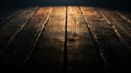 Dark rustic wooden planks illuminated from above.