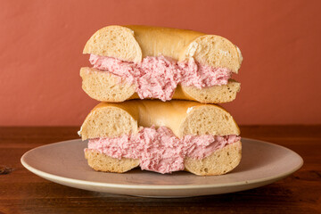 Strawberry cream cheese on a bagel