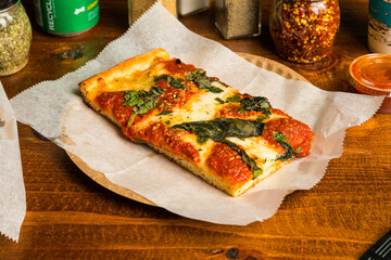 Slice of grandma pizza