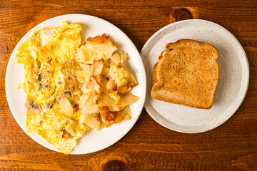 Omelette with potatoes and toast