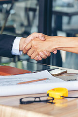 Vertical Businessman shaking hands together team partnership teamwork. Trust honesty business...