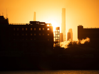 Rikers Island with view of Billionaire's Row in Manhattan during sunset