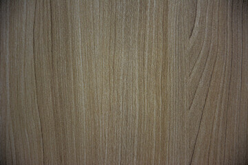 A close-up shot of a wooden texture background, showcasing a warm, natural wood grain pattern with subtle light and dark variations. Ideal for design, product display, or rustic themes.