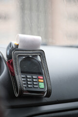 POS machine on yellow taxi 