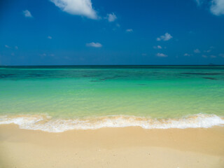 Horizon photogrphy beautiful landscape summer season vertical view tropical sea beach white sand clean blue sky background calm nature ocean wave water travel holiday at samae san island sun day time.