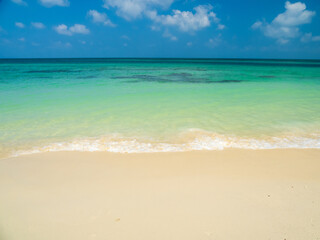 Fototapeta premium Horizon photogrphy beautiful landscape summer season vertical view tropical sea beach white sand clean blue sky background calm nature ocean wave water travel holiday at samae san island sun day time.