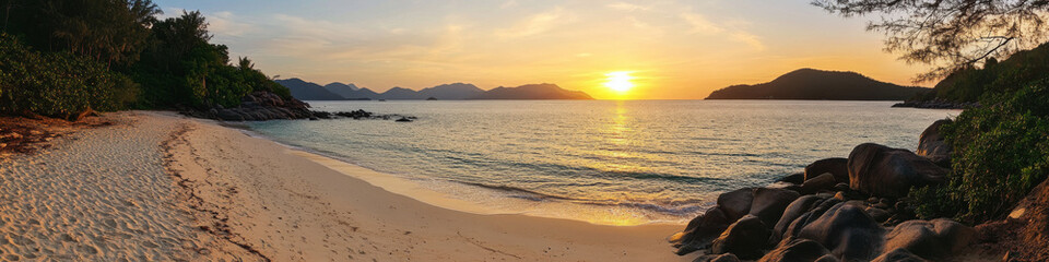 Fototapeta premium Photo of White sandy beach and blue sea during sunset give a warm and romantic feeling,
