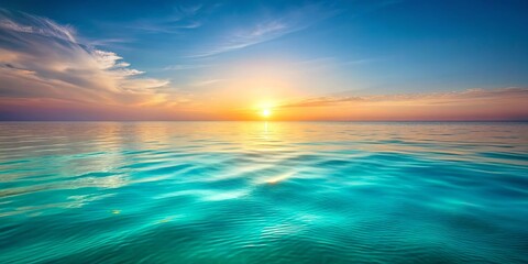 Obraz premium Serene ocean sunset with calm waves and colorful sky