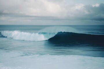 Fototapeta premium Majestic Ocean Wave Under Cloudy Skies