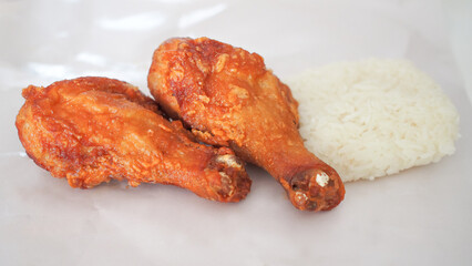 Thai Fried Chicken with Sticky Rice. Suitable for presenting Thai street food or as an illustration for simple recipe guides.