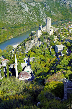 Aerial view of Pocitelj: the historical district with the Captain Havran Tower and the Sisman Ibrahim Pasha Mosque with the Neretva River in the background. Scenic places in Bosnia and Herzegovina