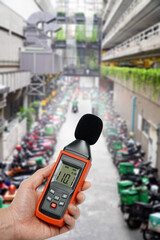 Measure the noise level on city roads motorcycle traffic.Noise pollution prevention concept