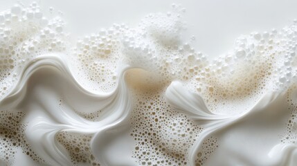 Delicate white bubble foam arranged in a zigzag pattern on a clean white surface, evoking luxury and purity with soft, intricate details and bright lighting, shot in a professional studio setting.