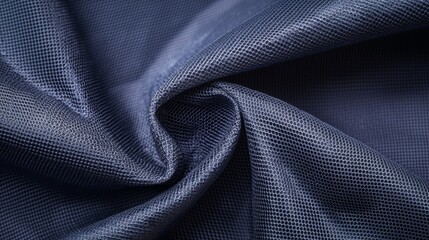Naklejka premium Fiberglass and innovation concept. Textured dark fabric with a swirling pattern.
