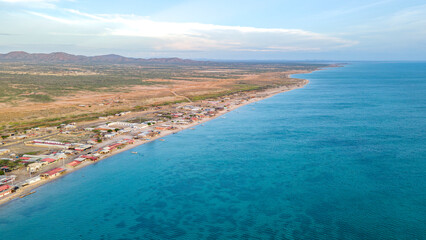 Fototapeta premium Aerial View of Cabo de la Vela, La Guajira: A Stunning Coastal Landscape in Colombia