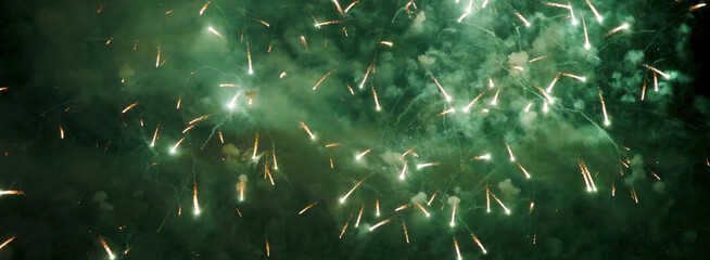 Banner Green firework in night time celebrate national holiday. Green Firework celebrate anniversary happy new year 2025 4th of july holiday festival. Countdown New year 2025 festival with copy space