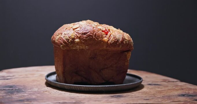 Sweet holiday bread, easter braided cake kozunak with turkish delight and almond nuts, christmas holiday sweets rustic video