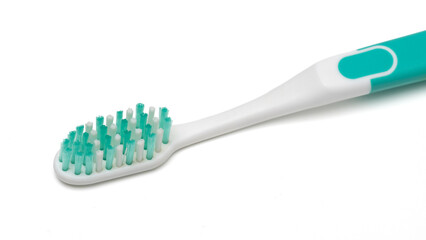 close up view of a toothbrush isolated on white background.