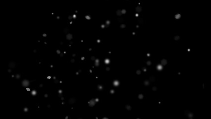 Winter freeze motion of white snow coming down, isolated on black background. Snowfall texture overlays.