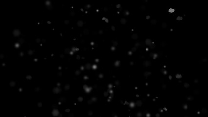 Winter freeze motion of white snow coming down, isolated on black background. Snowfall texture overlays.