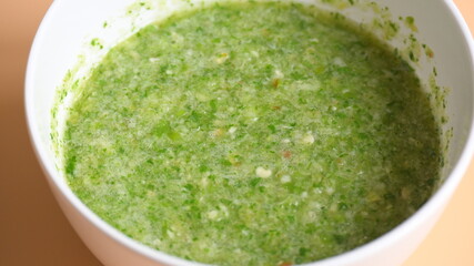 Thai spicy seafood dipping sauce on white bowl