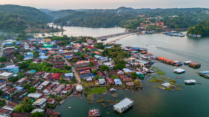 drone fly above famous wooden bridge in Mon village in Sangkhlaburi Thailand Aerial