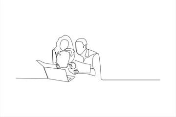 Couple working together on laptop.