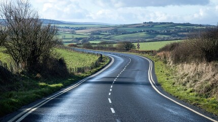 Typical UK road with familiar signage, road markings, and countryside or urban surroundings