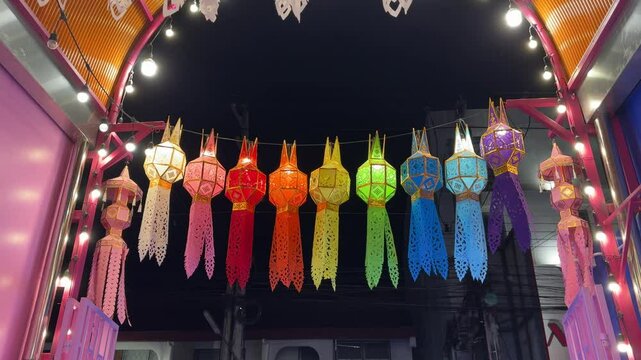 Thailand loi krathong yi peng festival hanging colorful paper lanterns over entrance	
