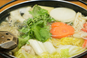 Mizutaki pot, a famous Japanese winter dish of stewed vegetables, meat, and seafood