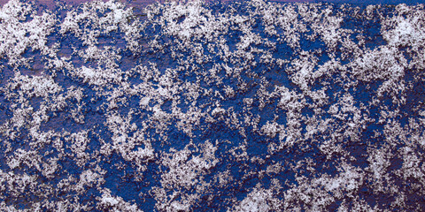 Obraz premium abstract bright beautiful blue snow and frost ice crystals on surface holiday winter background