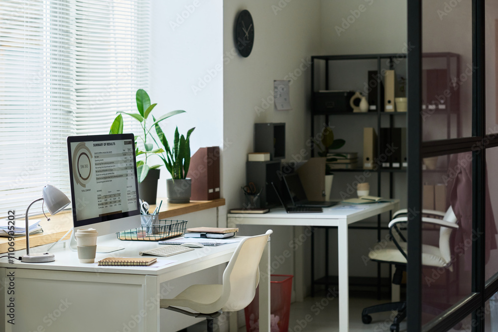 Poster workplace of financial analyst with desktop computer and keypad on background of table with laptop i