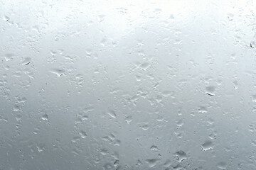 Raindrops on window glass. Rainy weather.