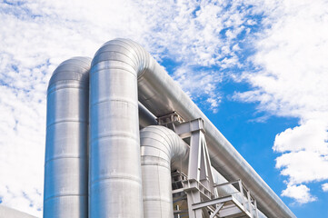 pipeline line close-up against blue sky and clouds