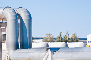 close up of fuel storage pipeline and tanks