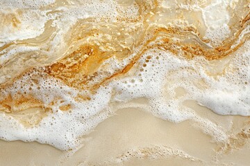 Obraz na płótnie Canvas summer background with sea sand and sea waves, top view 