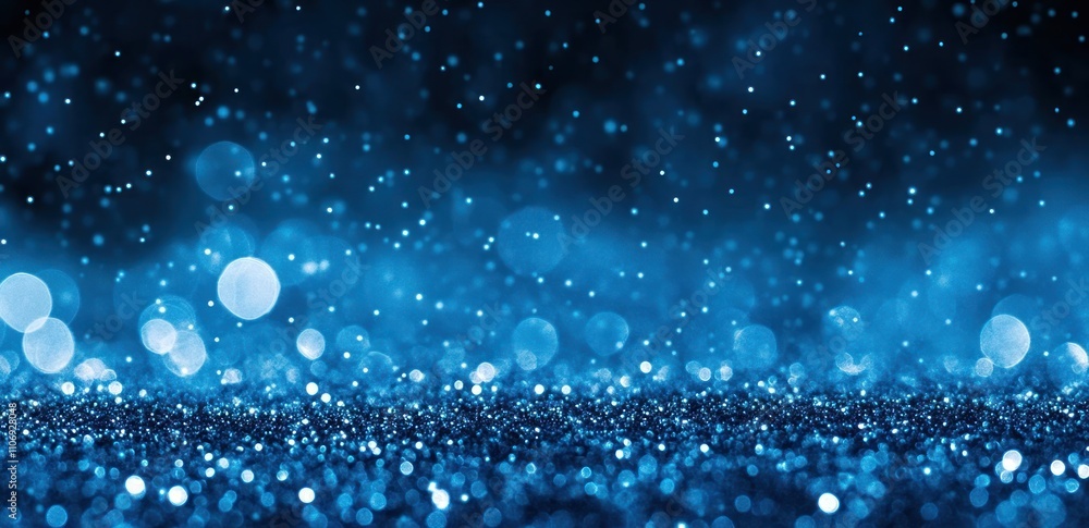 Poster A shimmering blue background with sparkling bokeh effects, ideal for design and digital projects.