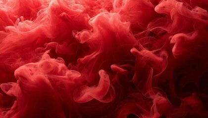 An abstract red smoke cloud blending with a black background evokes a sense of movement and mystery for artistic or professional use.